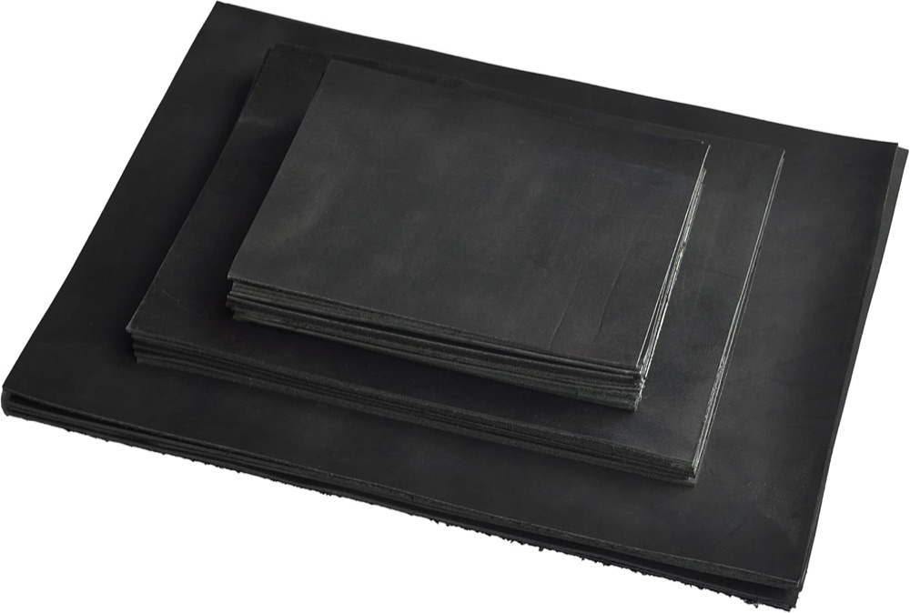 Placeholder photograph of black leather sheets in several sizes.